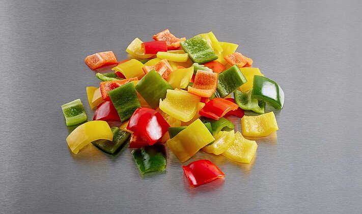 Colorful peppers cut into pieces
